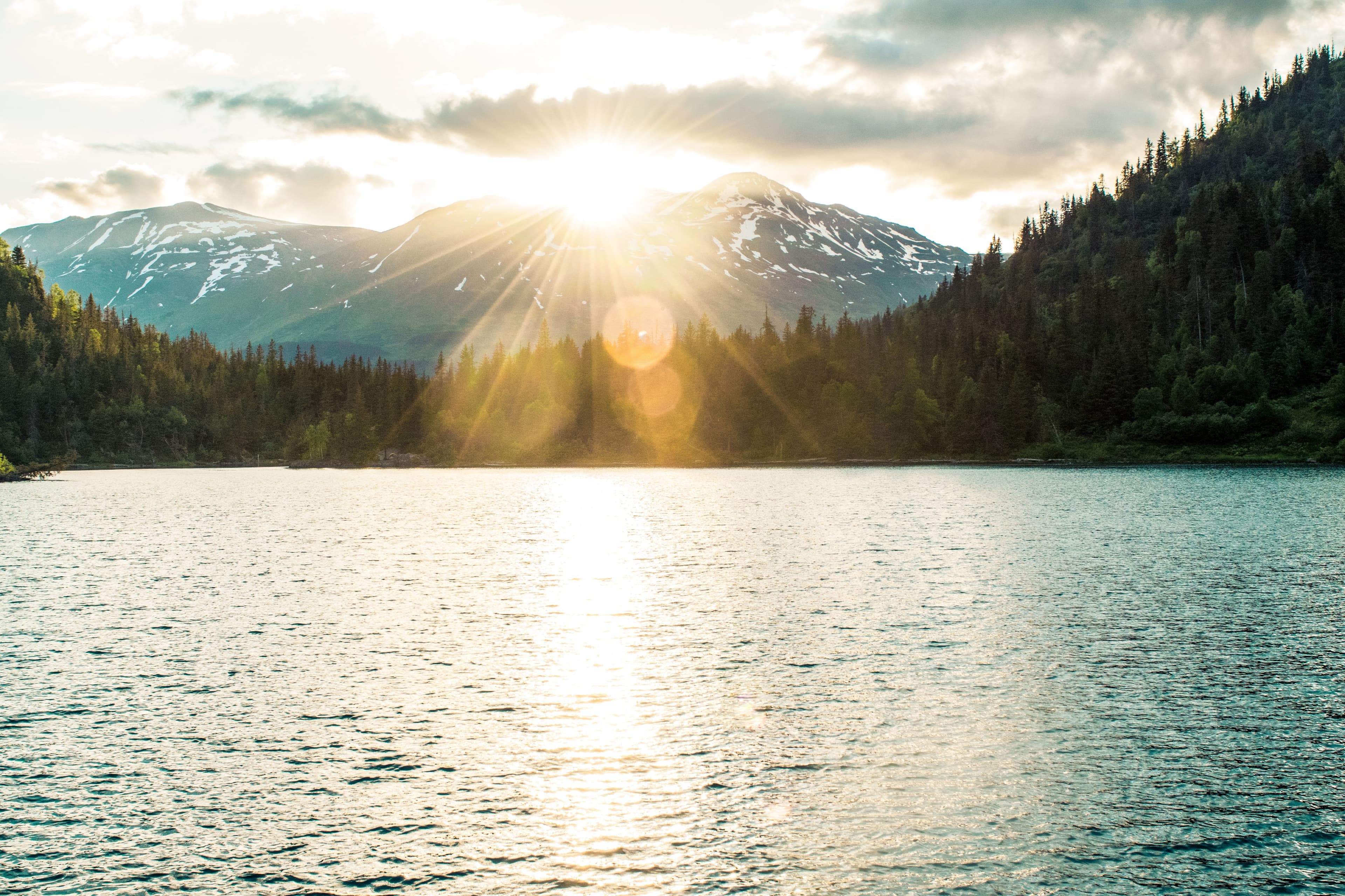 Sunrise over mountains and ocean